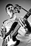 Marcin Kobza (piew, gitara)